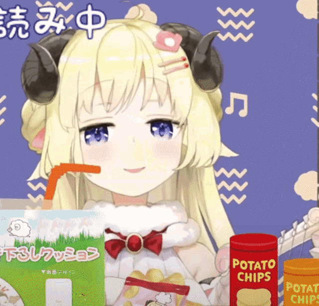 a girl with horns is drinking from a straw next to a bag of potato chips