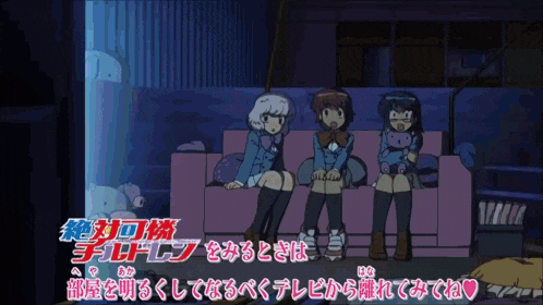 three girls are sitting on a couch in a dark room with chinese writing behind them