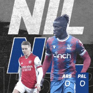 a soccer player in a red emirates fly better jersey stands next to another player in a blue cinch jersey