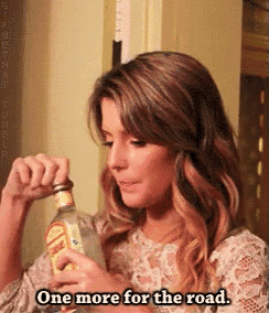a woman is drinking a bottle of tequila and saying one more for the road