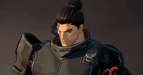 a man with a bun on his head is wearing a black armored suit