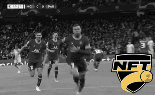 a group of soccer players running on a field with a nft logo in the corner