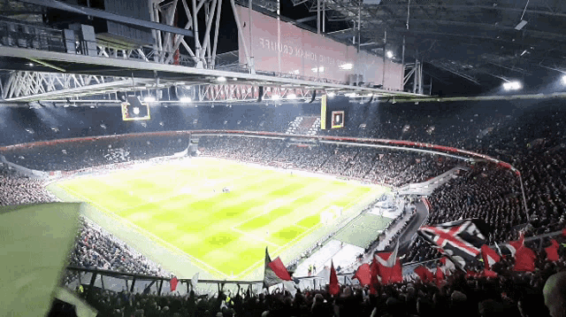 a large soccer stadium with a sign that says ' antwerp ' on it