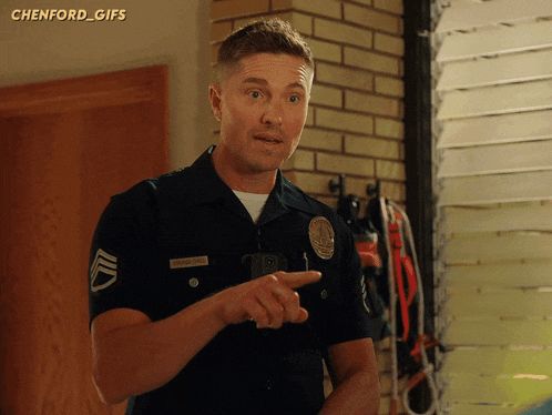 a police officer named chenford is pointing at something