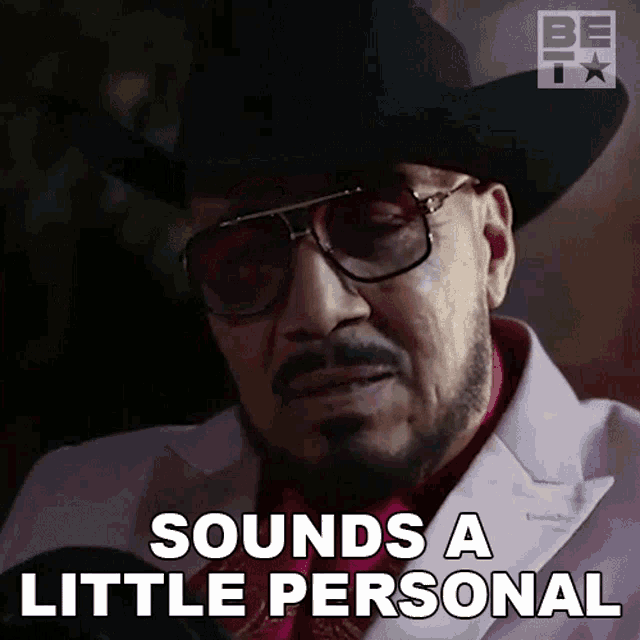 a man wearing a hat and sunglasses says sounds a little personal