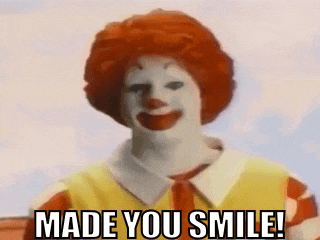 a mcdonald 's clown is smiling with the words made you smile below him