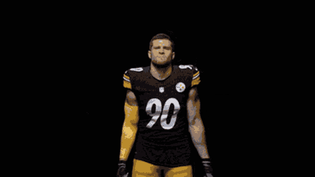 a football player with the number 90 on his shirt
