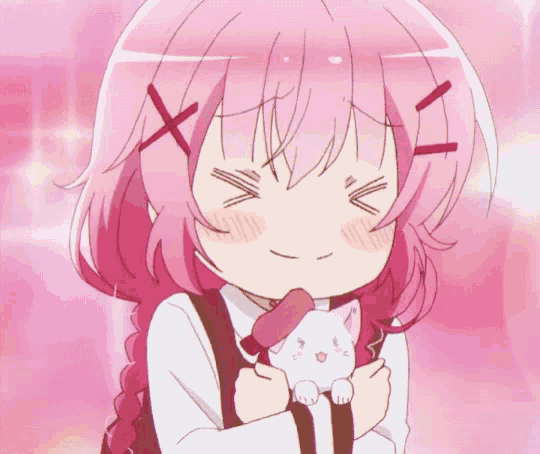 a girl with pink hair is holding a cat in her arms