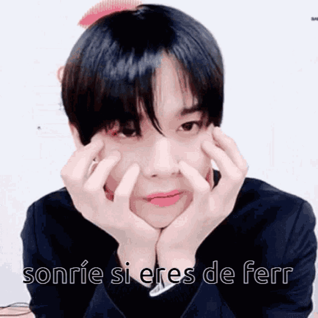 a close up of a person 's face with the words sonrie si eres de ferri written below it