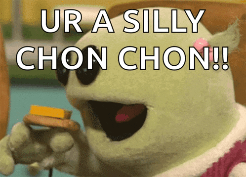 a stuffed animal says ur a silly chon chon while holding a piece of cheese
