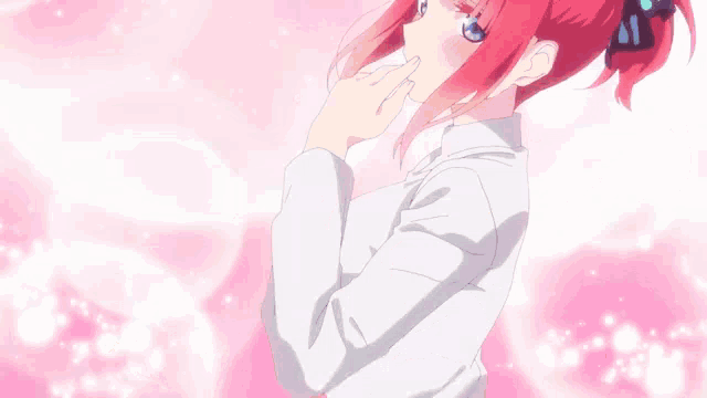 a girl with red hair and blue eyes is holding out her hand