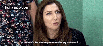 a woman is sitting in a staircase looking up at the sky and asking if there would be consequences for her actions .