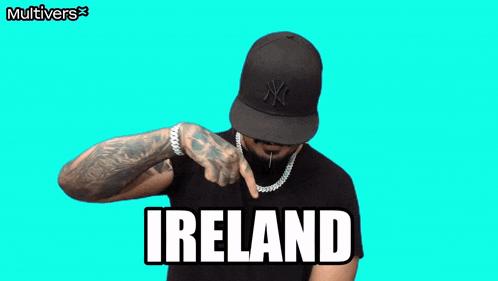 a man wearing a hat and a necklace with the word ireland written on it