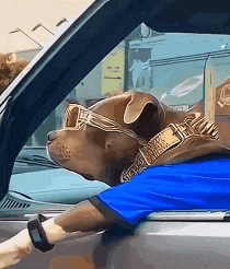 a dog wearing sunglasses and a blue shirt is sitting in the driver 's seat of a car
