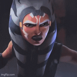 a close up of a person holding a blue light saber .