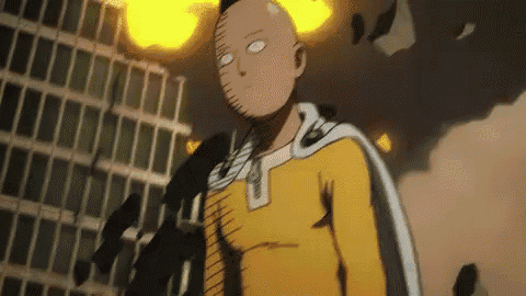 one punch man is standing in front of a building with a yellow cape on .