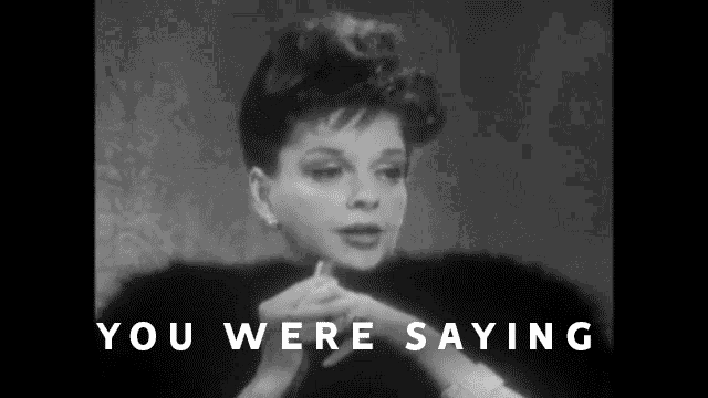 a black and white photo of a woman with the words `` you were saying '' below her