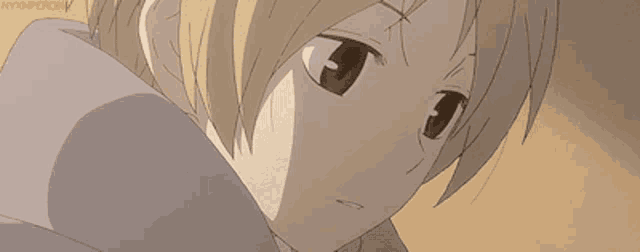 a close up of a anime character 's face with a hoodie on .