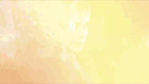 a woman 's face is reflected in a rainy window