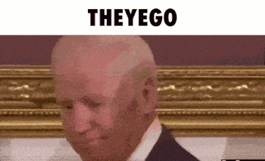 a close up of a man 's face with the words theyego written above him