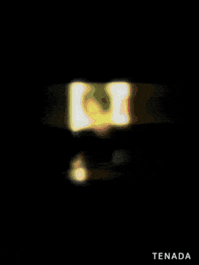 a blurred image of a person with the word tenada underneath it