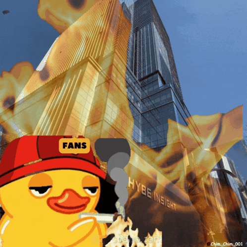 a yellow duck wearing a red hat with fans on it