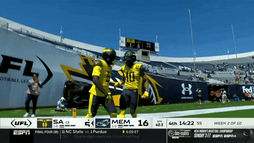 espn is broadcasting a football game between nc state and purdue