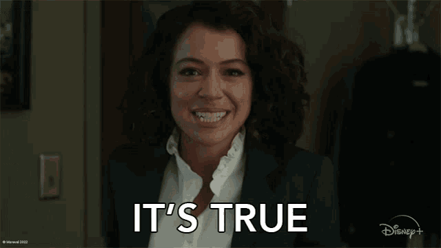 a woman says it 's true in front of a disney+ logo