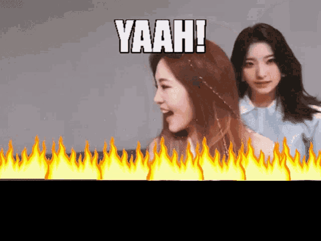 two women are standing next to each other with the word yaah above them .