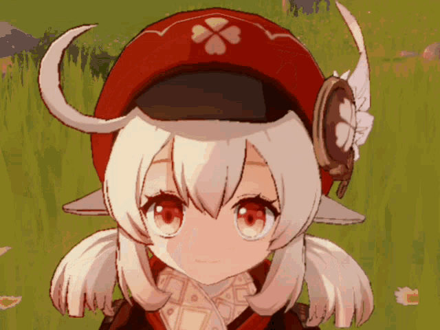 a cartoon character with a red hat with a flower on it