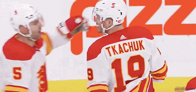 a hockey player with the number 10 on his jersey