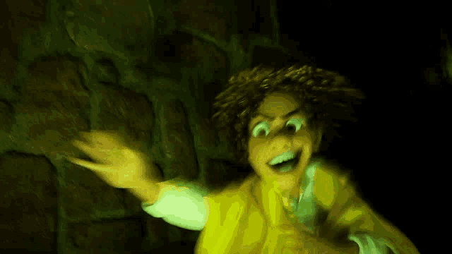 a cartoon character is standing in a dark room and waving .