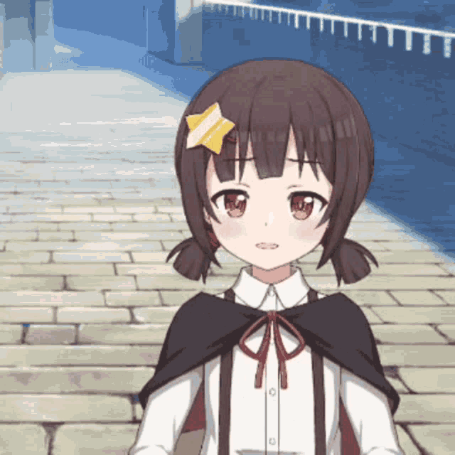 a girl with a star on her head is standing on a brick walkway