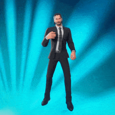 a man in a suit is standing in front of a blue background