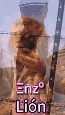 a picture of a man holding a lion with the name enzo lion on it