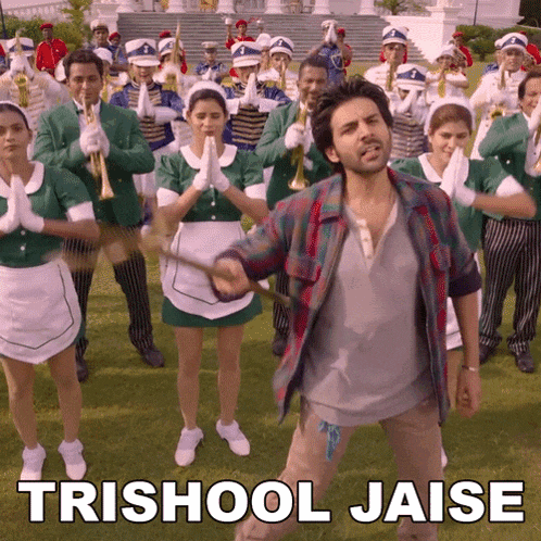 a man is holding a stick in front of a band that says trishool jaise on the bottom