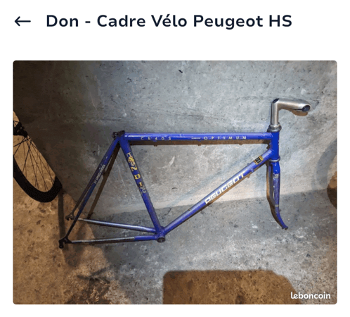 a picture of a blue peugeot bike frame