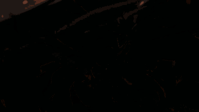 a drawing of a monster with red eyes and a glowing mouth