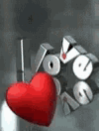 a red heart is hanging from a stick next to a sign that says `` i love you '' .
