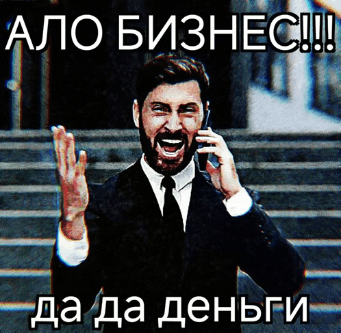 a man in a suit and tie is talking on a cellphone