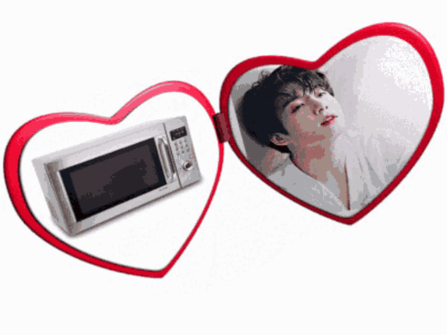a heart shaped picture frame with a picture of a man and a microwave on it