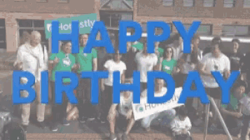 a group of people standing in front of a building with the words happy birthday written in green