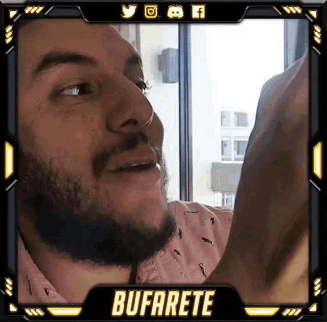 a man with a beard and the name bufarete on the bottom