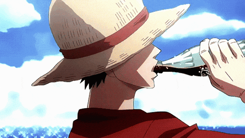 a man in a straw hat is drinking from a bottle