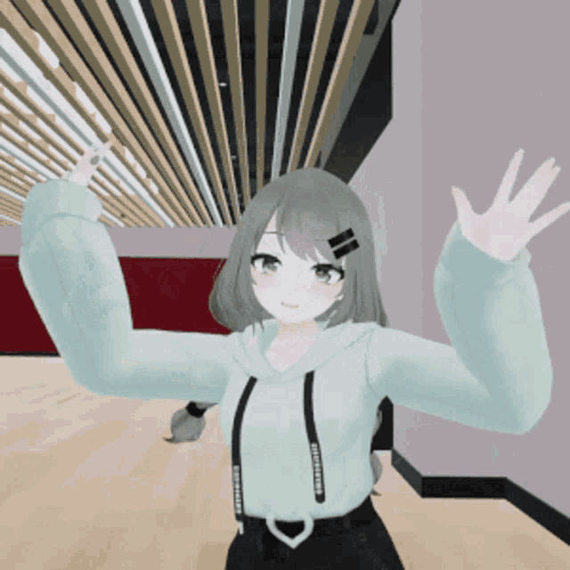 a girl in a hoodie with a heart on the belt is waving