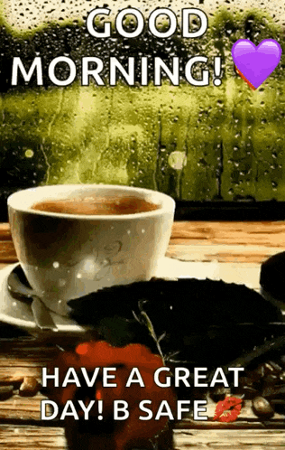 a cup of coffee is sitting on a saucer on a table with a purple heart .