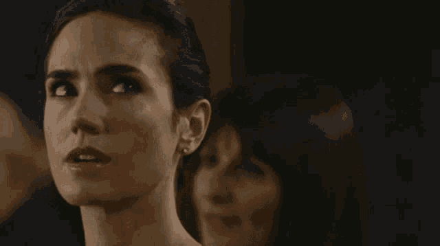 a woman with a surprised look on her face