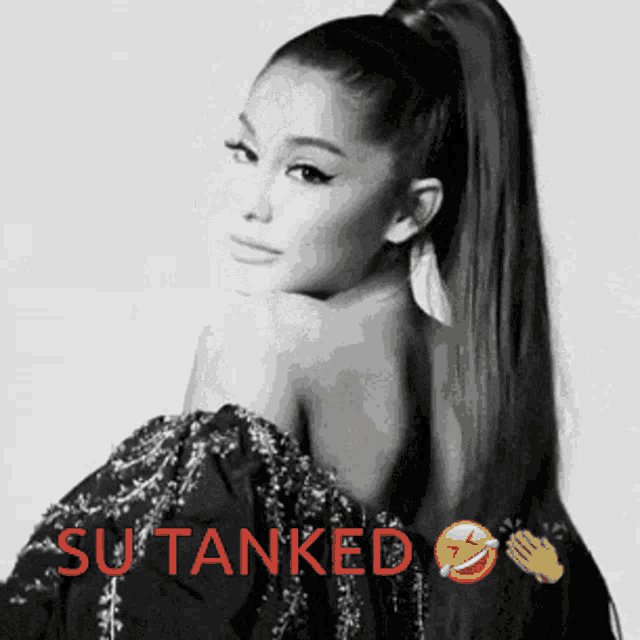 a black and white photo of a woman with a ponytail and the words su tanked