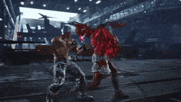 a man in a video game is fighting another man with a red light coming out of his chest