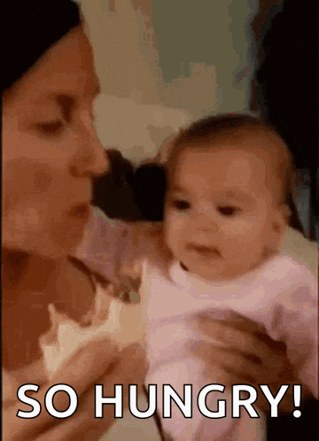 a woman is holding a baby with the words so hungry written on the bottom